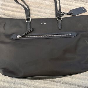 DKNY Sleek Black Handbag with Zipper Accent